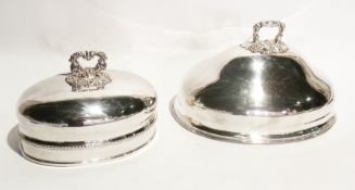 Two graduated oval EPNS meat domes