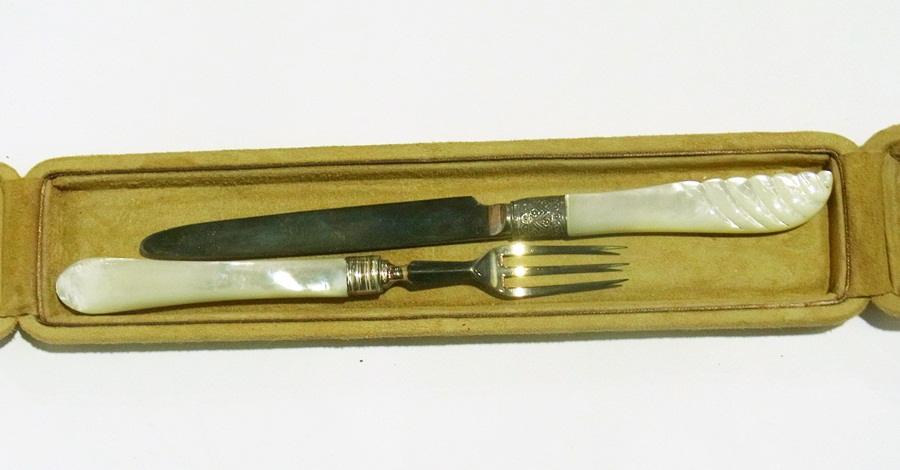 A Victorian matched silver knife and fork with mother-of-pearl handles