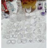 A cut glass decanter of baluster shape,