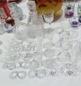 A cut glass decanter of baluster shape,