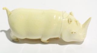Early 20th century African carved ivory model of a rhinoceros,