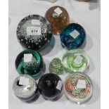 A quantity of paperweights including Cai