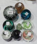 A quantity of paperweights including Cai