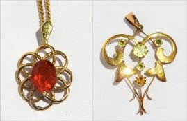 9ct gold and peridot pierced scroll pendant,