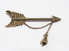 Silver arrow brooch having pierced engra