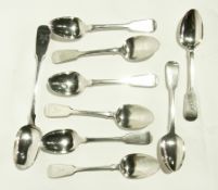 William IV silver 'fiddle' pattern basting spoon together with eight matching tablespoons,