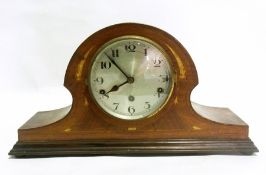 A mantel clock with stringing inlay and