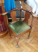 Early 19th century mahogany corner chair with green velvet drop-in seat,