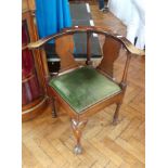 Early 19th century mahogany corner chair with green velvet drop-in seat,