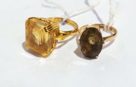 A 22ct gold and yellow stone dress ring