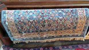 A blue ground cashmere rug,