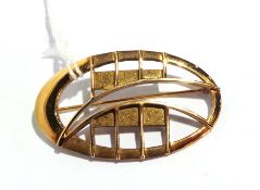 9ct gold oval pierced abstract brooch in
