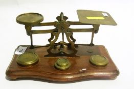 A pair of postal scales and weights