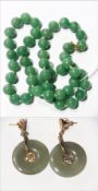 String of jade beads and a pair of gold and jade drop earrings