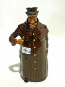 Royal Doulton treacle glaze flask in the form of a coachman 26cms high