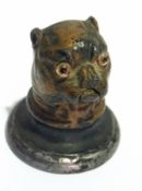 A Victorian painted metal pug inkwell with glass eyes,