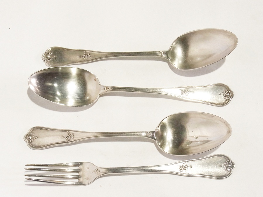 Three matching foreign silver tablespoon
