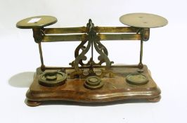 Pair of postage scales with weights, a b