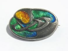 Liberty Art Nouveau silver and enamel brooch, oval, heart and scroll design with yellow,