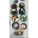 A selection of paperweights including Mi