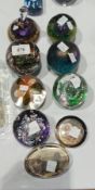 A selection of paperweights including Mi