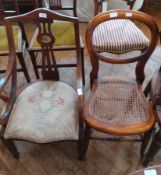 An Edwardian mahogany balloon back chair