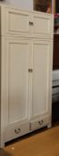 A cream painted hardwood double wardrobe