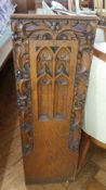 An oak gothic and floral carved prayer r