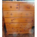 A pine chest  with two short drawers and