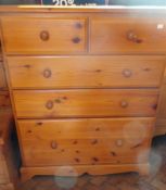 A pine chest  with two short drawers and