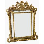 19th century style giltwood carved mirror in rococo foliate frame with cupid surmount,