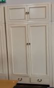 A cream painted hardwood double wardrobe