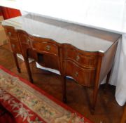 George III mahogany wavy front sideboard with frieze drawer above tambour-fronted shelf,