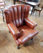 Georgian style leather armchair with studded padded back, loose cushion seat,