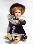 Unis France bisque-headed doll with sleeping eyes,