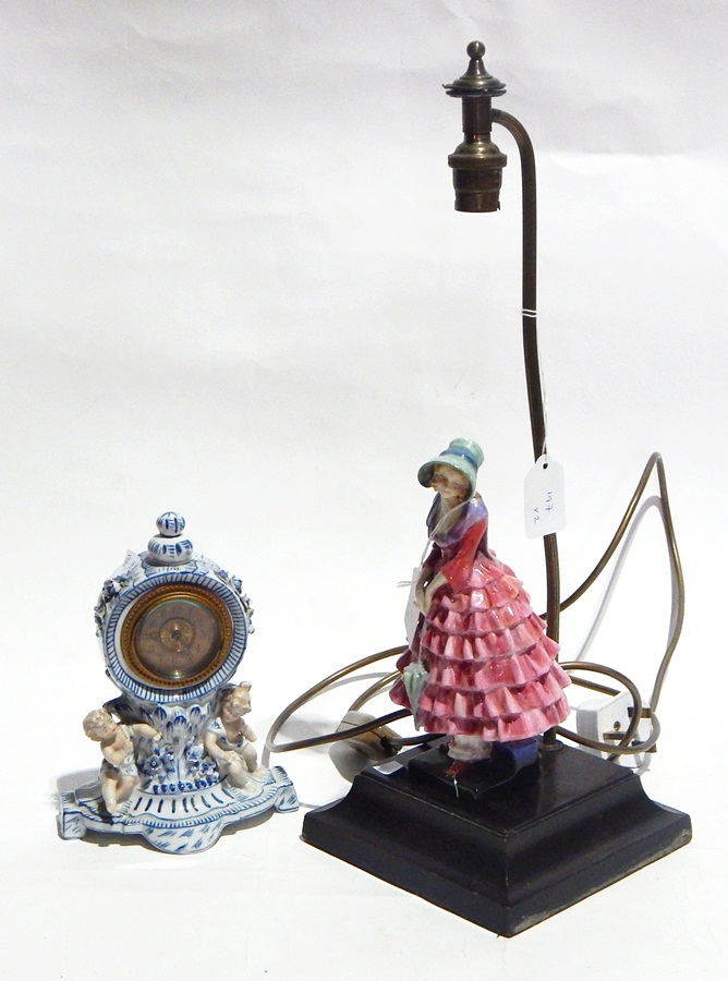Continental porcelain cased mantel time-piece, blue and white with putti, 20cms high and table lamp, - Image 2 of 2