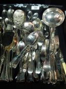 A quantity of silver plate flatware to include basting spoons,