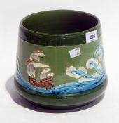 Eichwald majolica pottery jardiniere decorated with sailing galleon and waves, on a green ground,