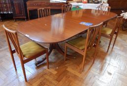 George III style mahogany D-end extending double pedestal dining table on reeded swept supports