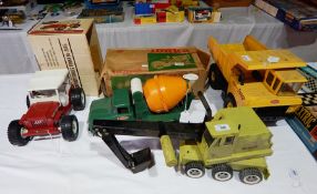 Quantity of large Tonka trucks, including: cement mixer 620, boxed, and Dune Buggy No 2445,