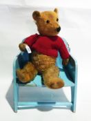 Gold plush teddy bear and Tiger Toys child's chair