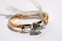 9ct gold solitaire diamond ring in raised claw mount, the diamond approximately 0.