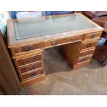 20th century yew pedestal desk with leather top,