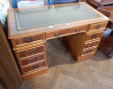 20th century yew pedestal desk with leather top,