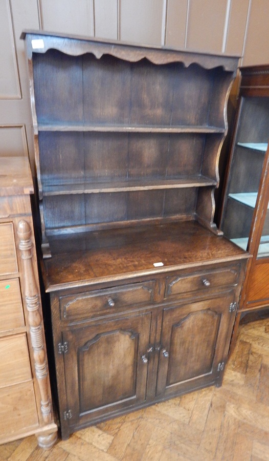 Reproduction oak dresser with open shelf plate rack,