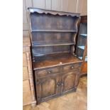 Reproduction oak dresser with open shelf plate rack,