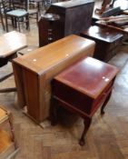 A contemporary side table with sliding shelf on cabriole legs together with a twentieth century oak