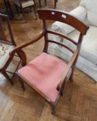 A Victorian mahogany bar back armchair with upholstered seat,
