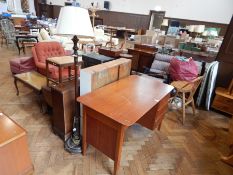 Teak kneehole desk with one frieze and three drawers to a pedestal,