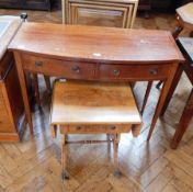 A reproduction mahogany bowfront side table with two frieze drawers, on square tapering legs,